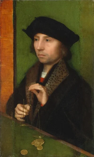 adrien isenbrandt man weighing gold